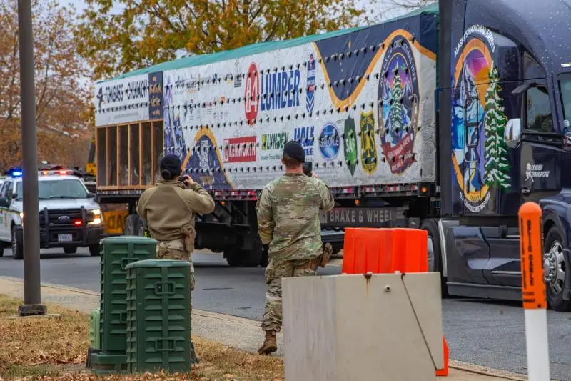 Dover AFB families given free Christmas trees from 84 Lumber